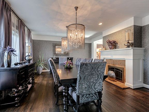 DR w/FP, rich wallpaper, 2 chandeliers, large windows