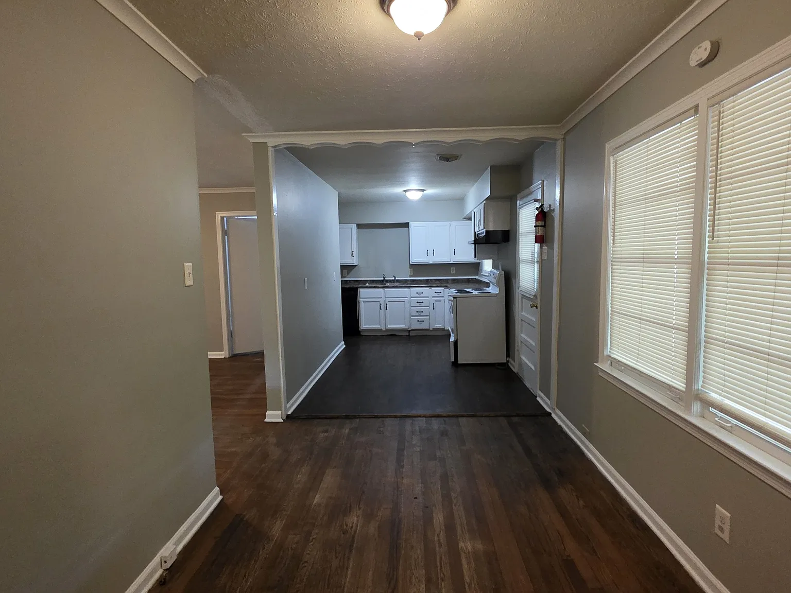Charming Brick Home with Fenced Backyard & Carport — Photo 4
