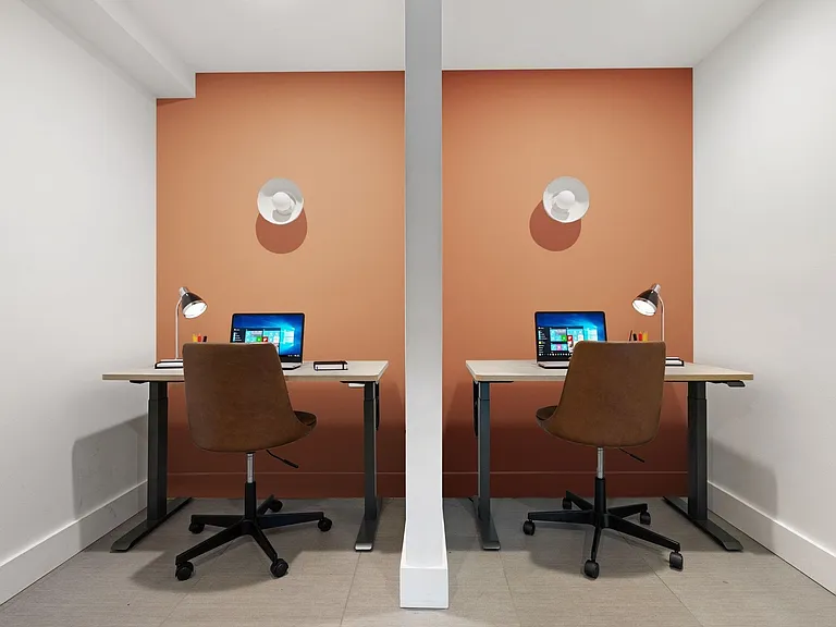 Focus on heads-down work at a private desk steps from your front door