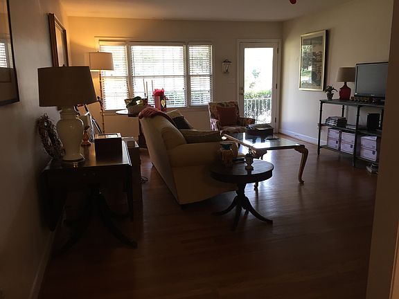large living room with large windows and great light opens onto great front porch