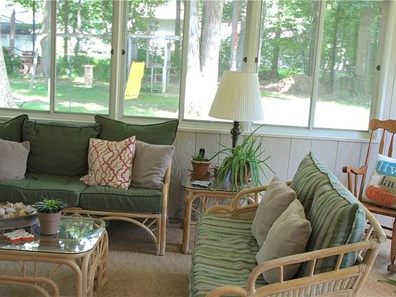 SUN ROOM OVERLOOKING BACKYARD