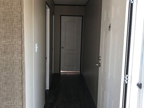 Hallway to bedrooms and bath