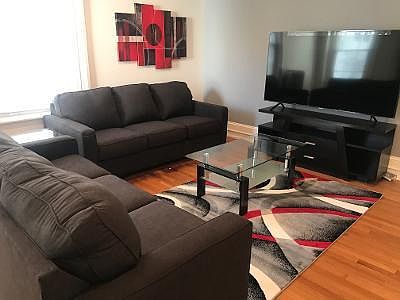 Furnished Living Room with 70" TV