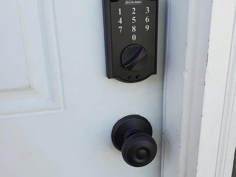 Keyless entry on apartment and laundry door.