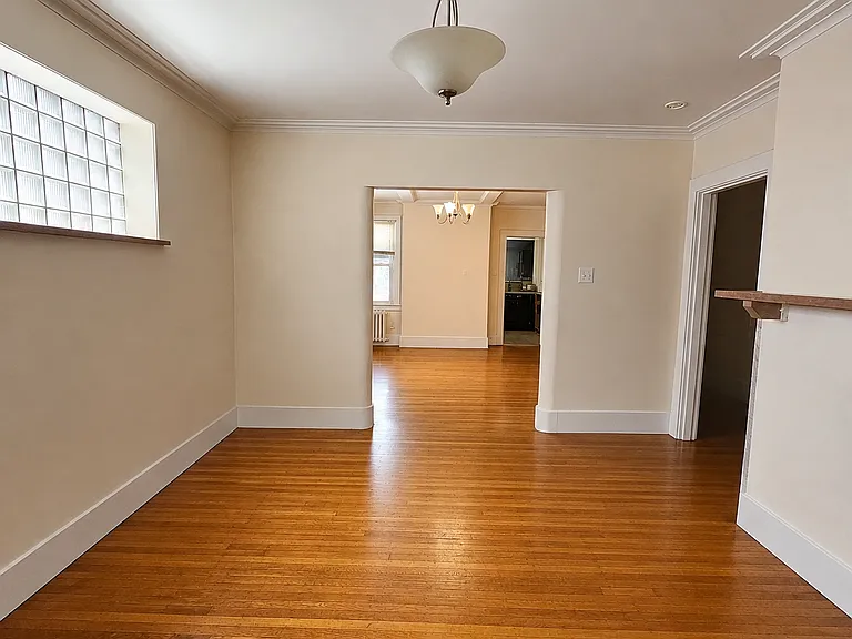 Living room with view of dining room