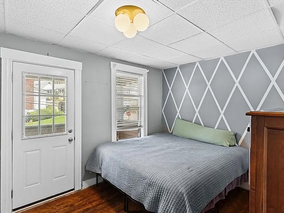 Main bedroom with access to front porch.