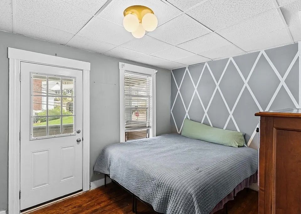 Main bedroom with access to front porch.