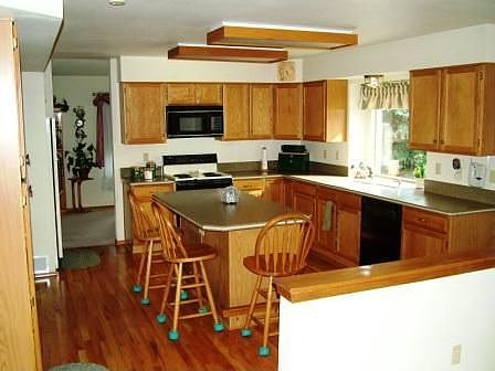 Kitchen has Island/Breakfast Bar and Pantry