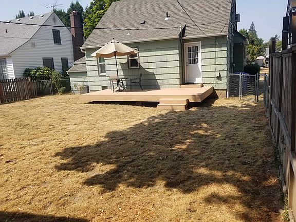 back of house, deck and back yard