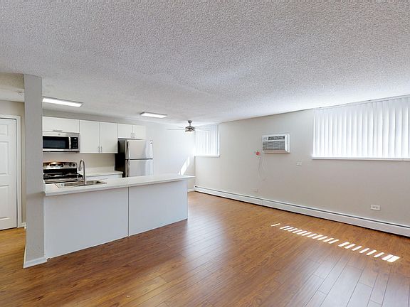 Spacious living space and kitchen area