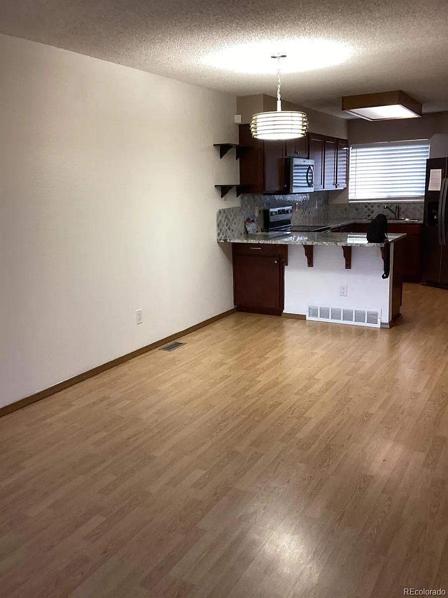 Building Photo - 8733 W Cornell Ave #9