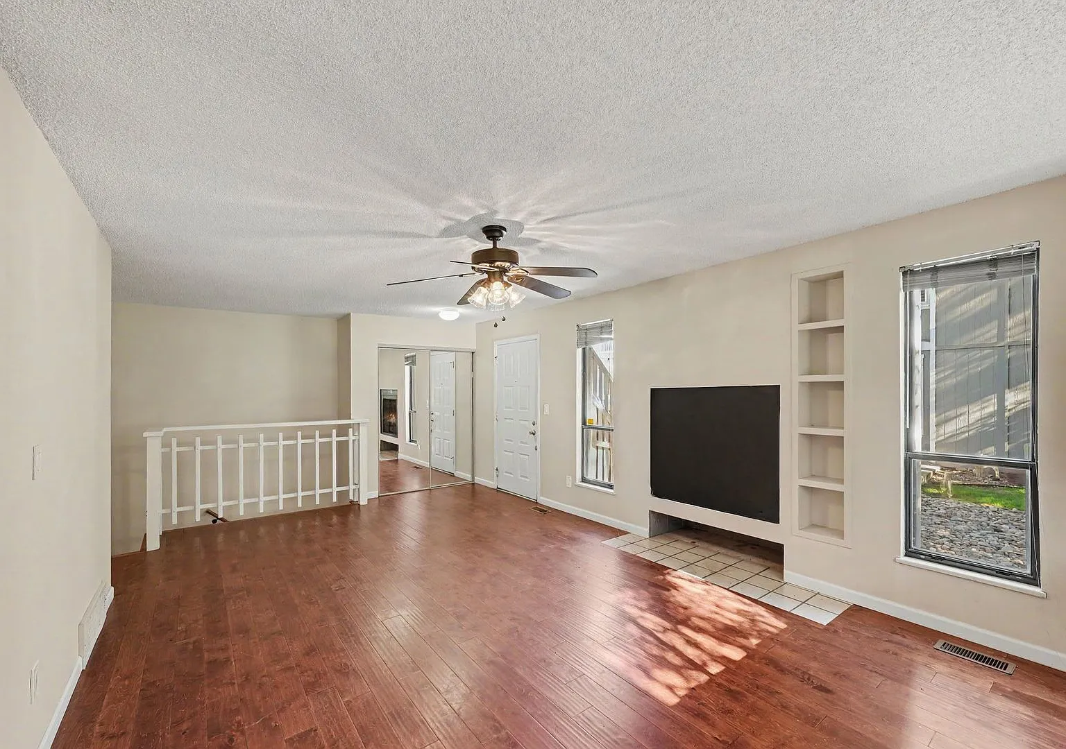 Spacious 2BR/2BA Corner Unit with Finished Basement, Private Patio & Garage — Photo 2