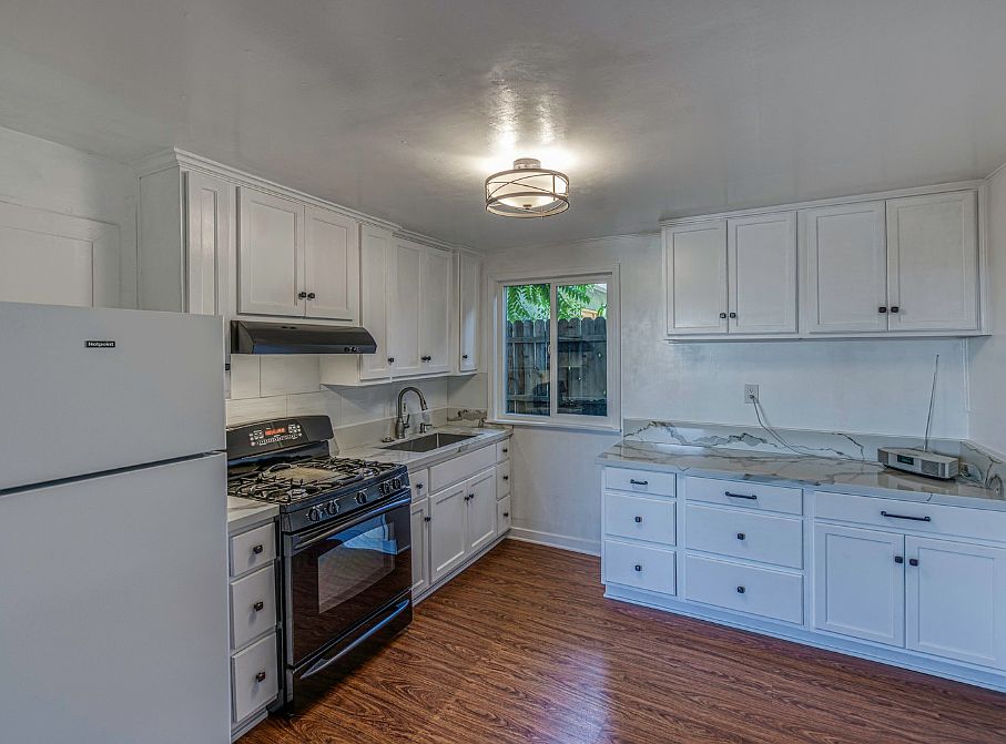 Tons of storage and pantry! You will love this renovated cabinet and granite counter tops