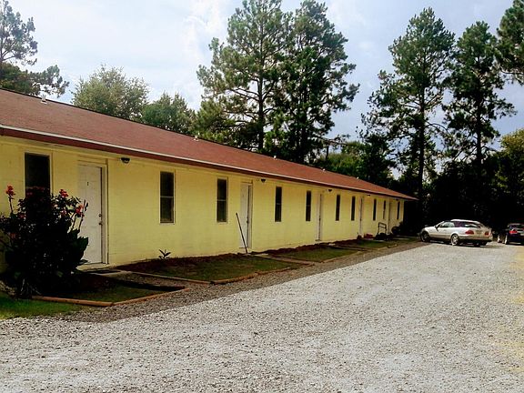 Full building photo (4 Buildings in complex). All apartments are one story high.