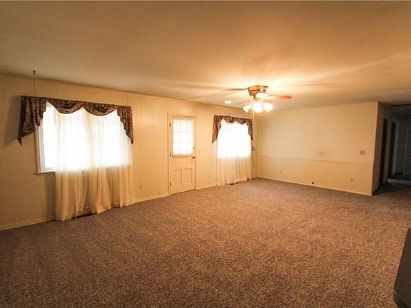 Another view of the living room. New carpet February 2018.