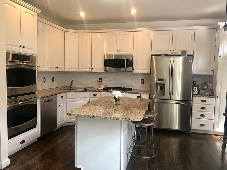 Upgraded Kitchen with pantry and dinning area and access to deck.