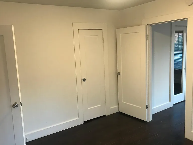 Bedroom looking towards study door and closet