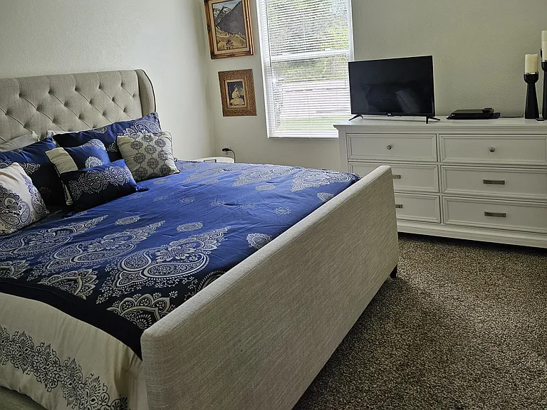 Master with Furniture shown. Furniture not included. The apartment is unfurnished.