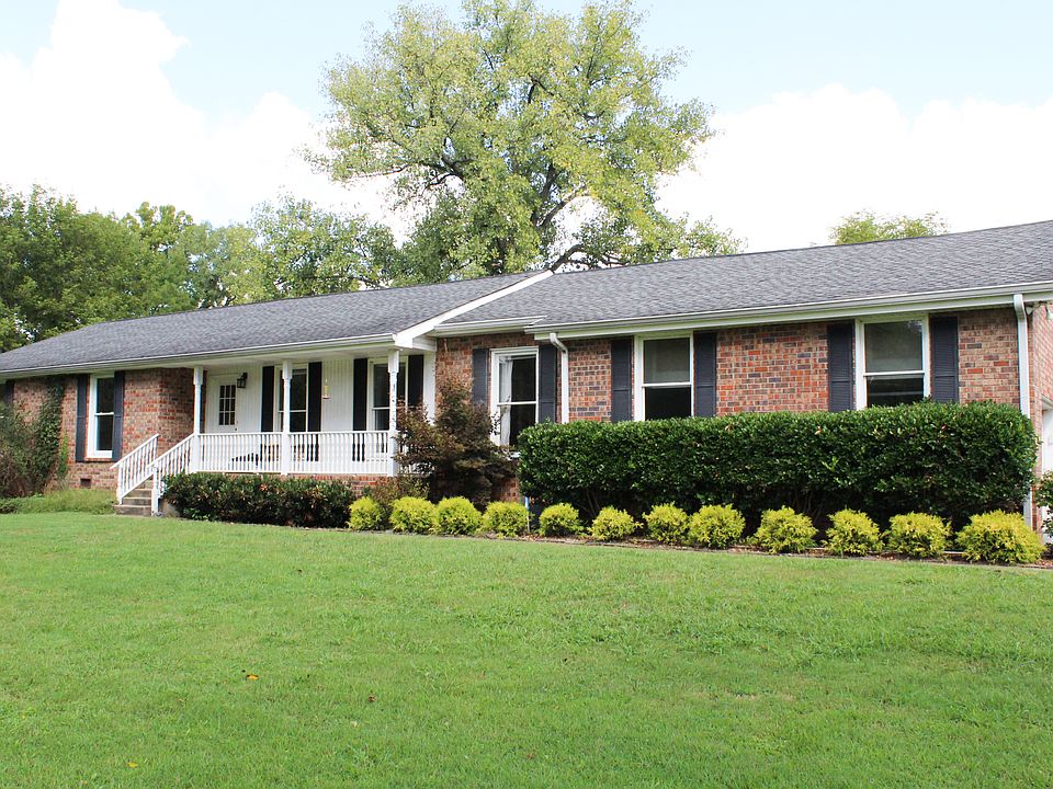 Spacious ranch home with covered front porch on just over an acre in the quiet countryside of Mt. Juliet.