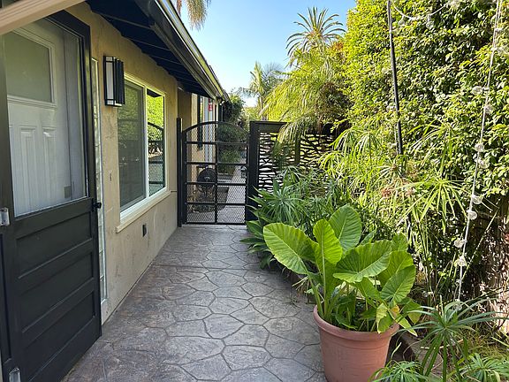 Entrance to 3325 with private gate and home entrance