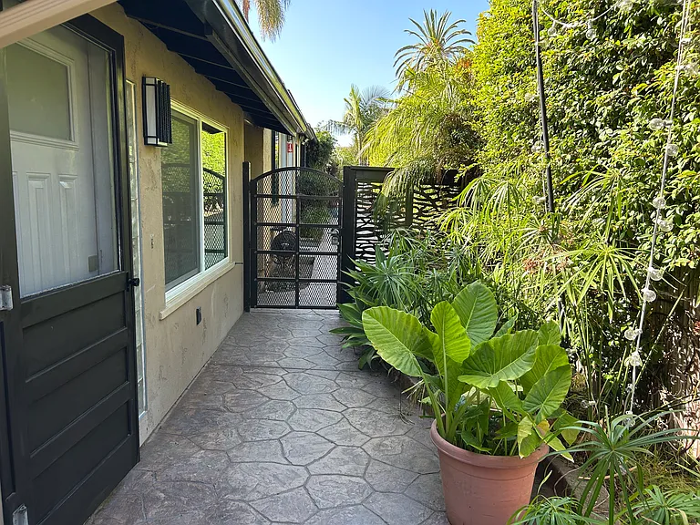 Entrance to 3325 with private gate and home entrance