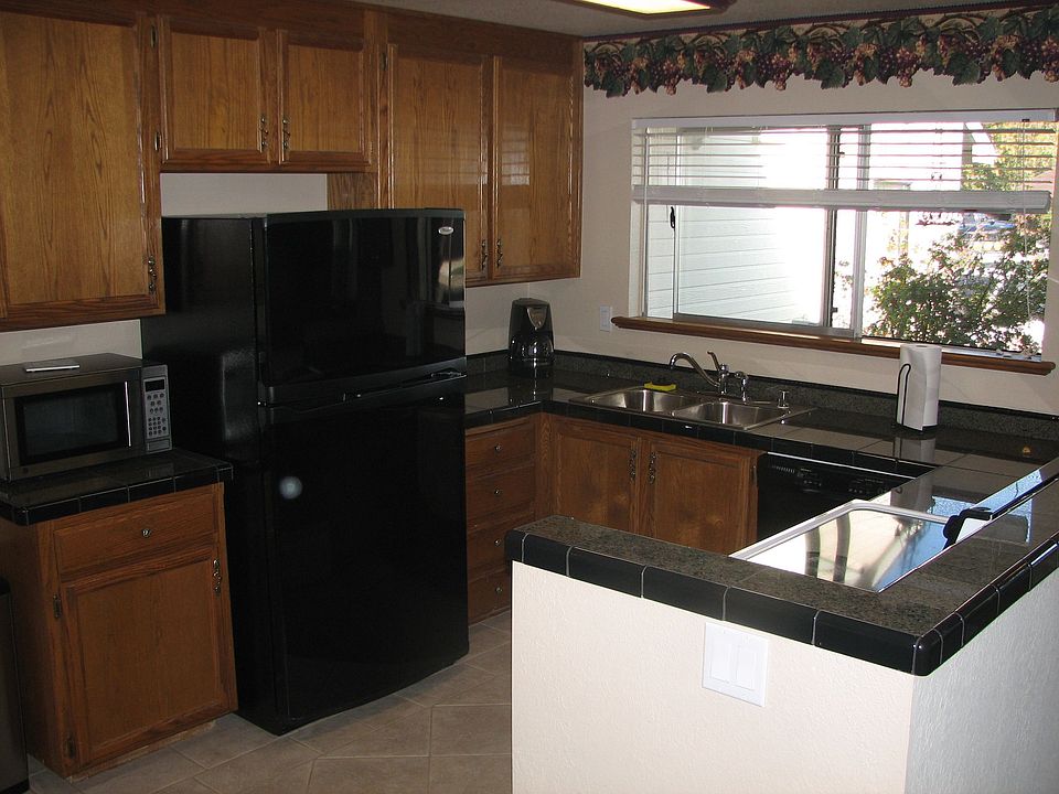 2007 Kitchen remodel looking out front window toward entry