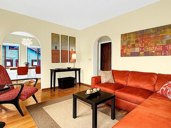 Lovely dining room also opens to living room with access to the fully finished lower level. Both rooms are flooded with natural daylight thanks to plenty of double pane windows. Also on the main floor you will find an updated full bath plus a spacious bedroom. Hardwood flooring