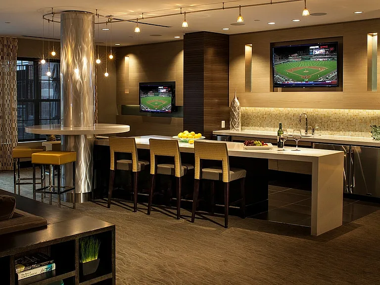 Contemporary Club Room With Bar Area, TV & Numerous Seating Areas