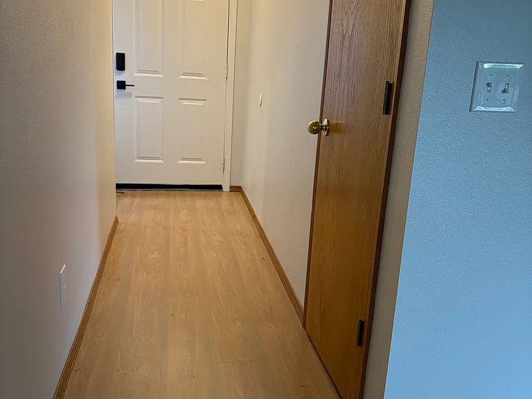 Hallway back to front door and bedroom #3