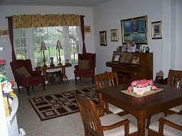 Both formals off of entry with ceramic tile floors
