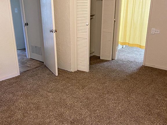 smaller bedroom connected to larger bedroom. does not have door