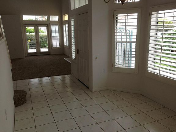 living/dining room w/French doors to patio