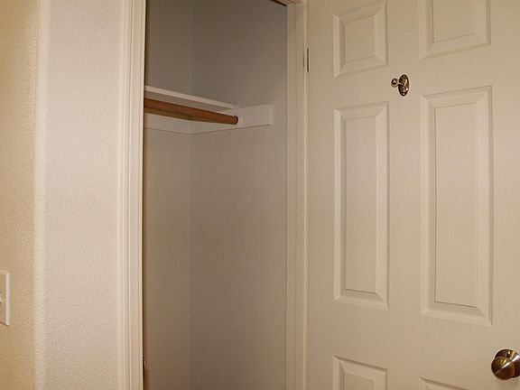 Hallway closet where washer and dryer hookups will go.