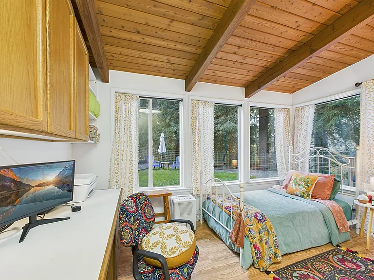 +Sunroom/office
+Exterior Access
+Desk with monitor/printer
+Workout bike + yoga equipment
+Door locks