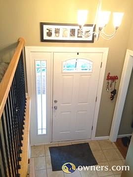 This beautiful, bright foyer is what you walk in to.
