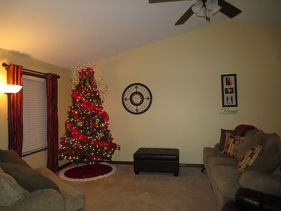 Main floor living room with furniture in it