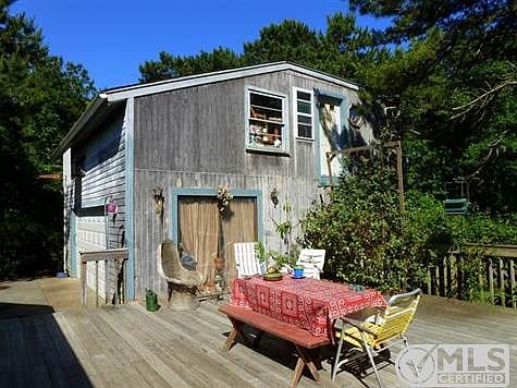 another view of the deck looking onto the garage/barn