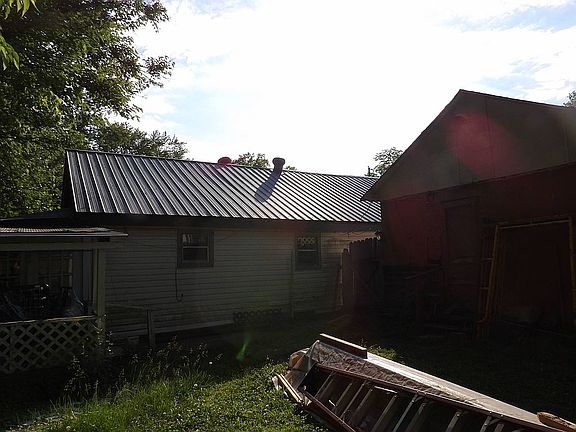 Back of carport shed/house