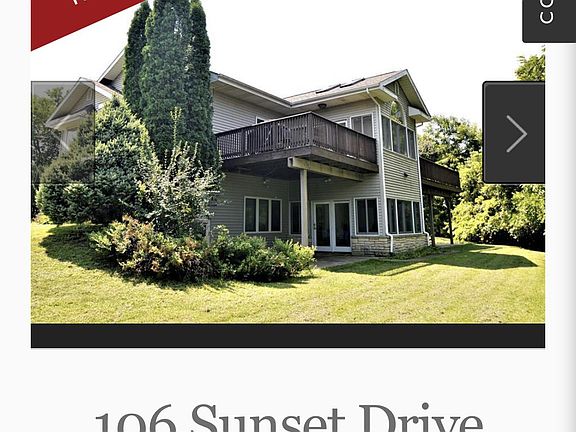 A sunroom up top with TWO decks from either side and a hot t