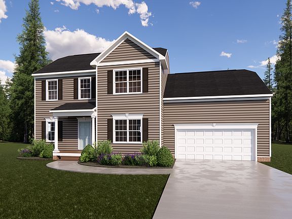 This charming two-story brown house in Poplar Village features white trim, a garage, and a curved dr