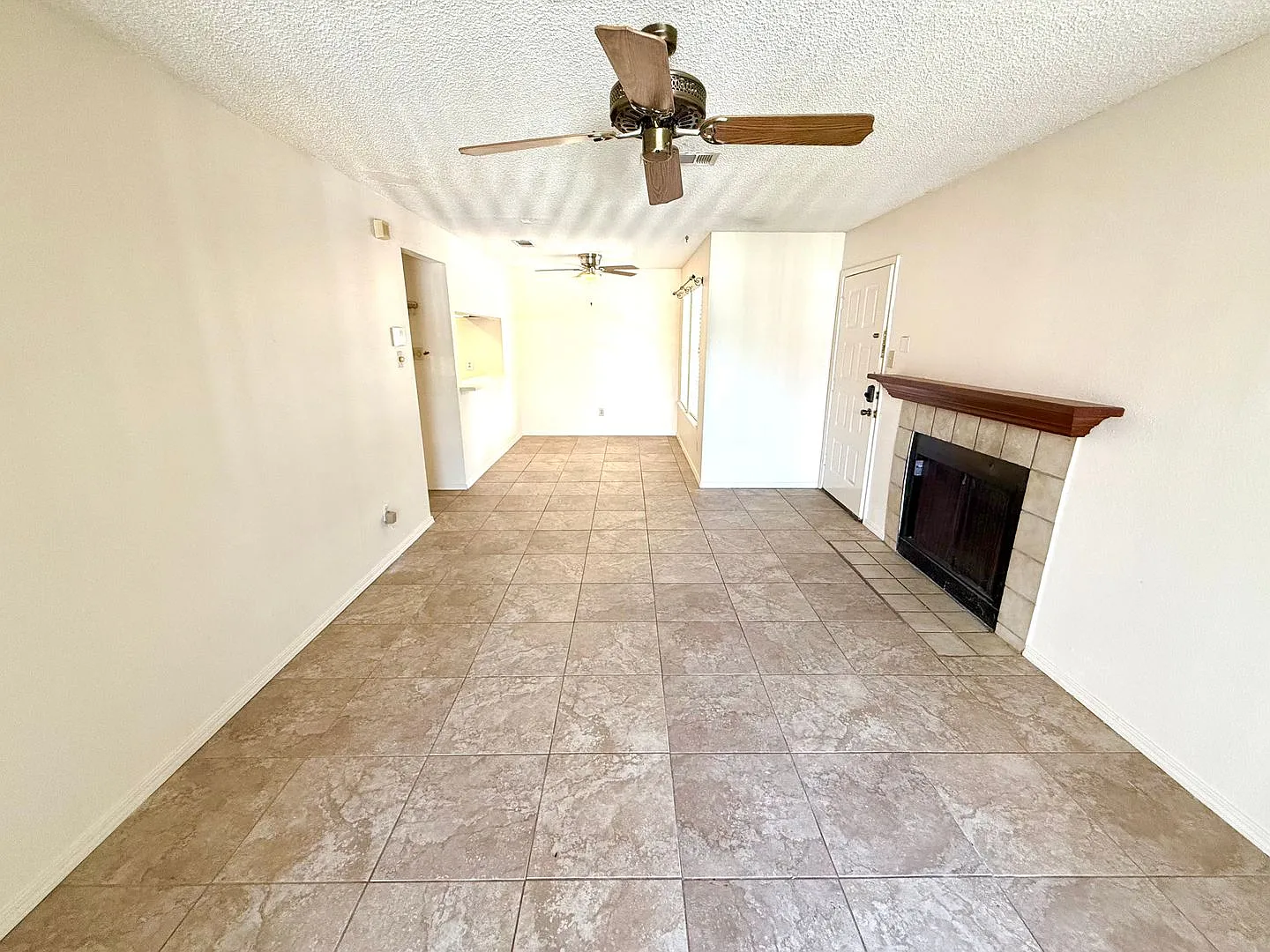 Move-In Ready 2BD/2BA with Fireplace, In-Unit Laundry & Community Pool! — Photo 3