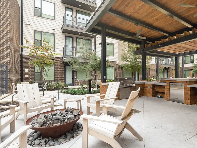 Outdoor Lounge with Fire Pit and Grilling Area