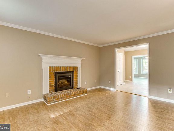 Family Rm boasts WB fireplace w electric insert!