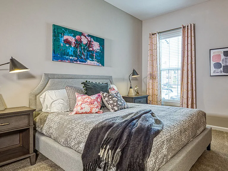 Spacious, bright bedrooms with neutral carpet.