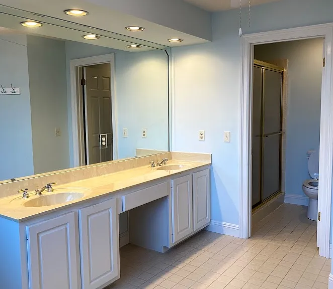 Bedroom #2 very large bathroom with standing shower and plenty of natural light.
