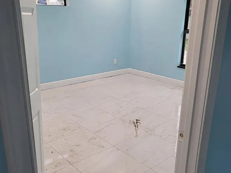 409 Broward Ave — Photo 11