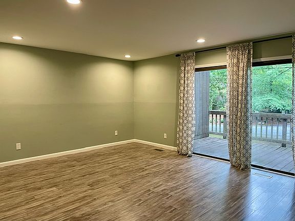 Living Room with balcony/deck door