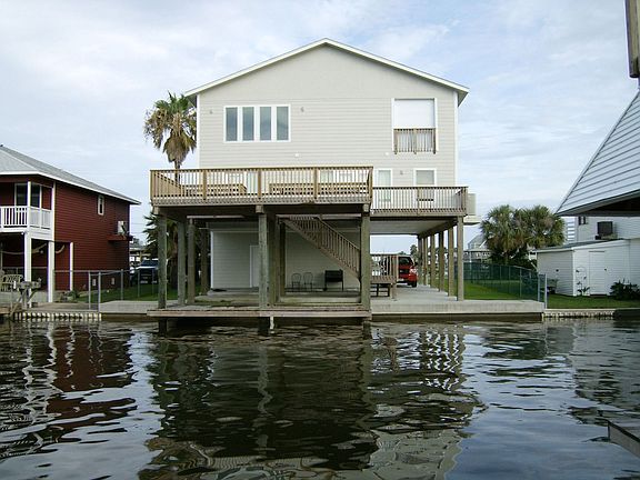 Great view of rear elevation taken from across the canal.