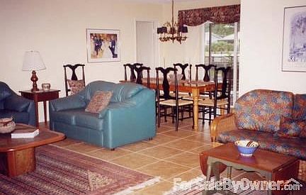 Living room and dining room : Large living room area adjoins dining room.