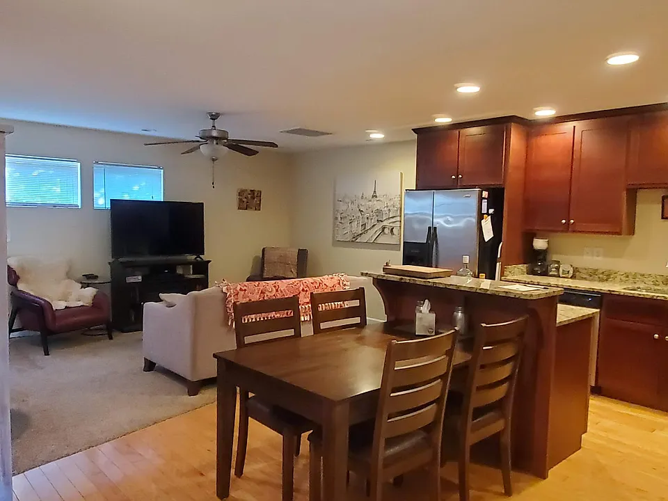 View of the Dining Room, Kitchen and Living Room from the front door.